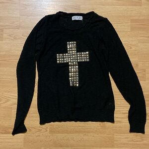 Black sweater with gold cross